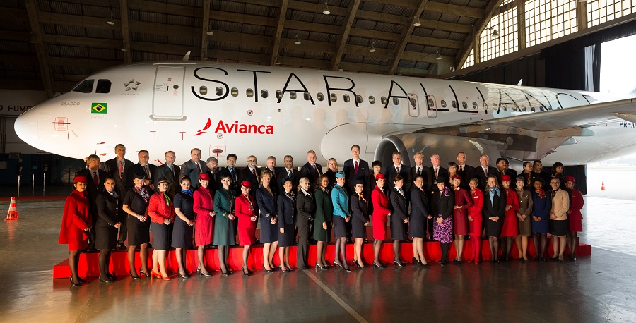 Star Alliance CEOs and top executives, along with uniformed staff members welcome Avianca Brasil to the Star Alliance family