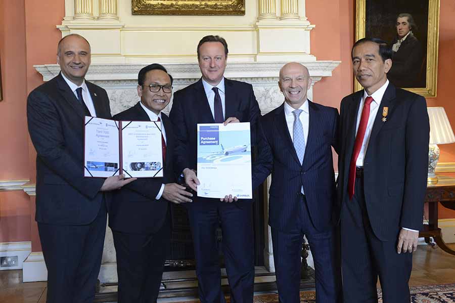 David Cameron welcomes President Jokowi of Indonesia to Downing Street. During his visit the Prime Minister and President hold a bilateral meeting and a working lunch. The Prime Minister and President have a photograph taken with Airbus, Aerospace and Garuda International Airlines after deals were signed in Downing Street today, worth more than one billion to the UK economy.